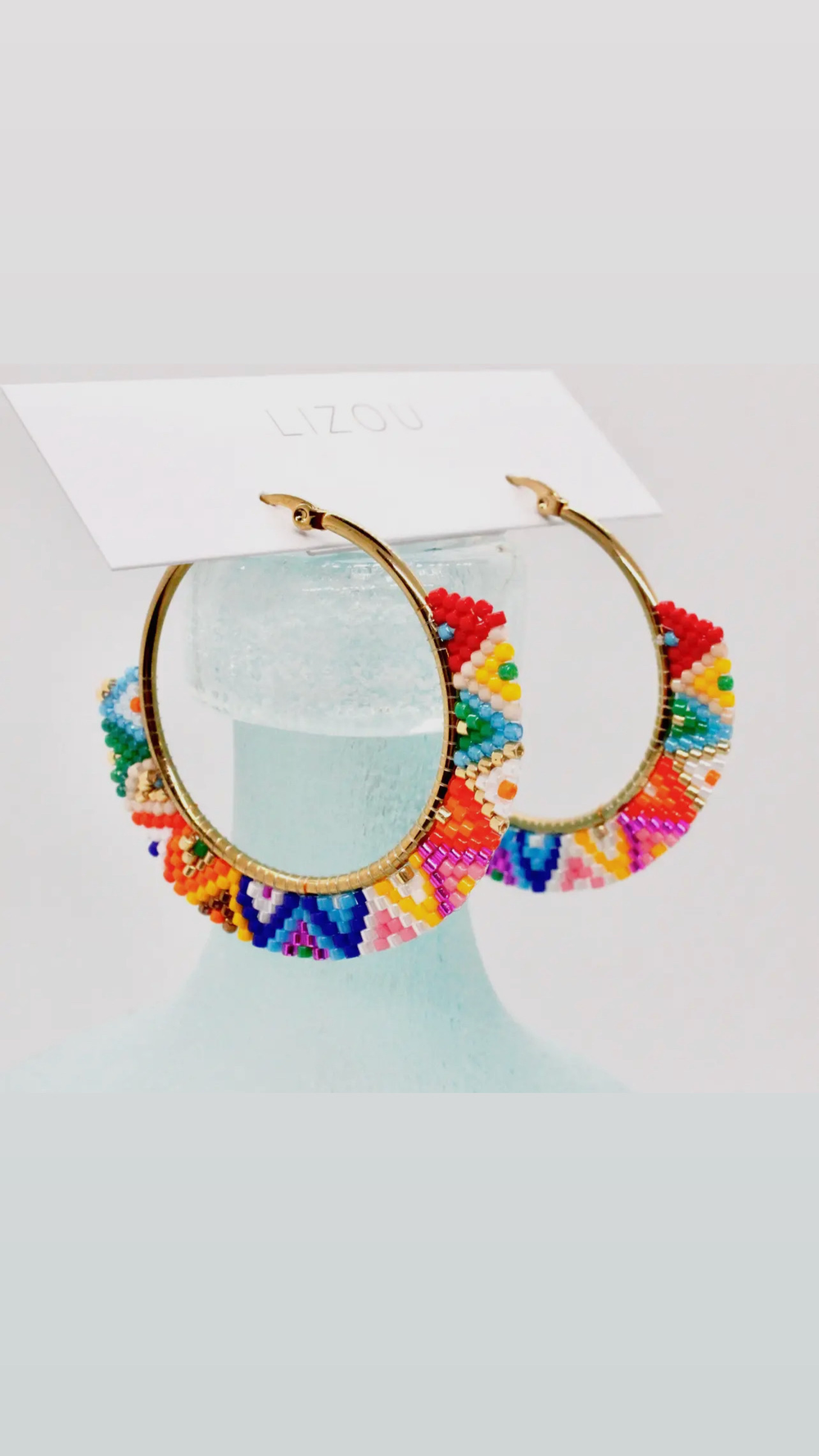Material World black-and-gold beaded hoop earrings crafted by women artisans, ethically sourced fair-trade jewelry