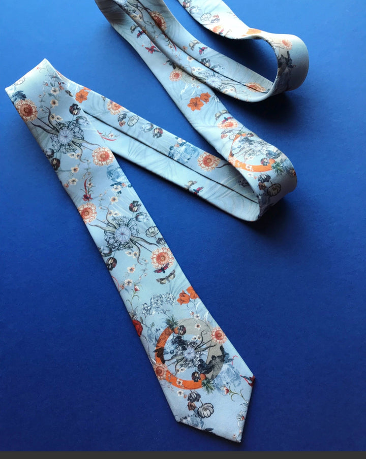 Hand painted, 100% silk pale blue tie with floral print