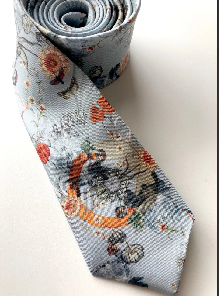 Hand painted, 100% silk pale blue tie with floral print