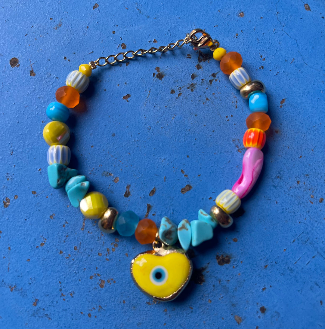 Yellow evil eye with rainbow glass and ceramic beads bracelet