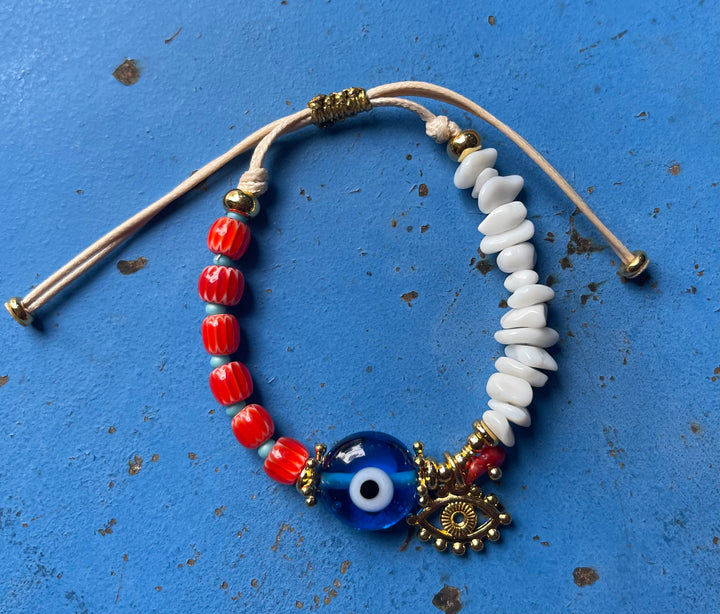 Red semi precious beads with blue evil eye protection bracelet