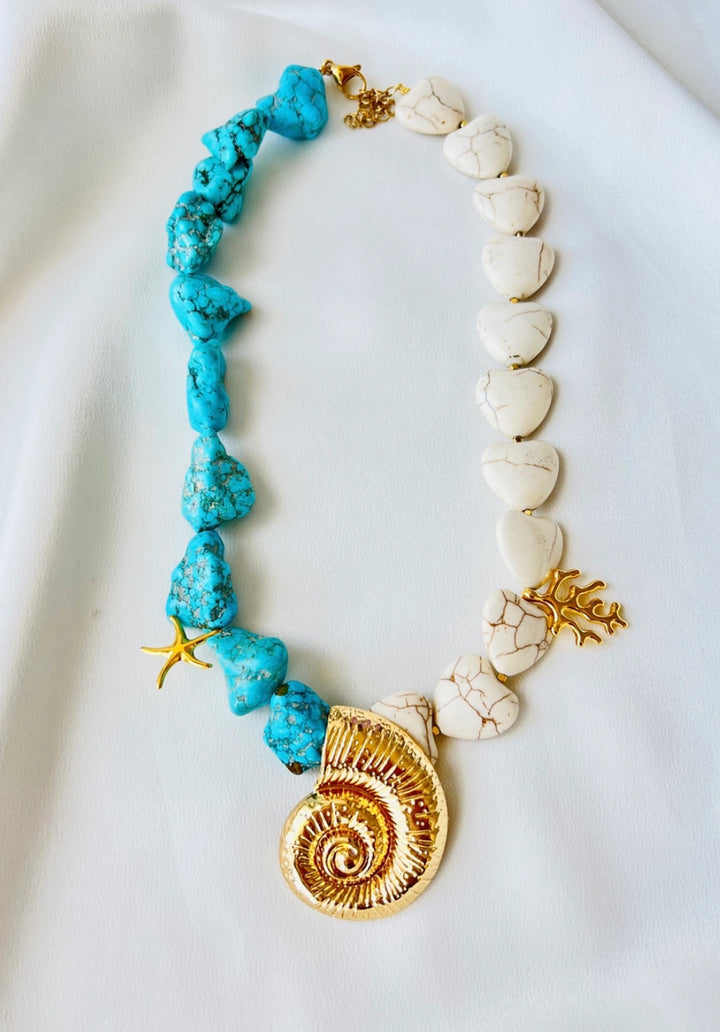 Gold plated seashell with turquoise and semiprecious howlite stones necklace