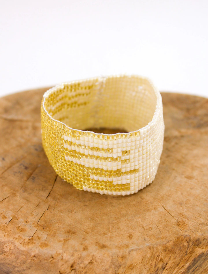 Hand Beaded cream and gold metallic stretch bracelet