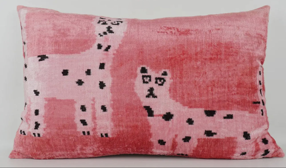 Material World pink velvet throw pillow featuring a handwoven llama design, perfect for fair-trade home décor