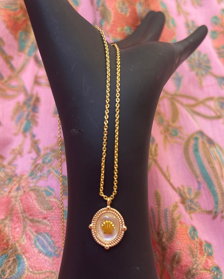 Gold Seashell Necklace on Mother of Pearl Base