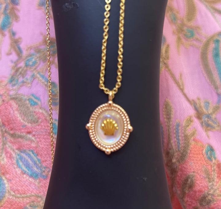 Gold Seashell Necklace on Mother of Pearl Base